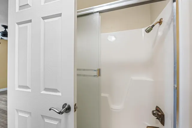 a view of a street with an ocean view