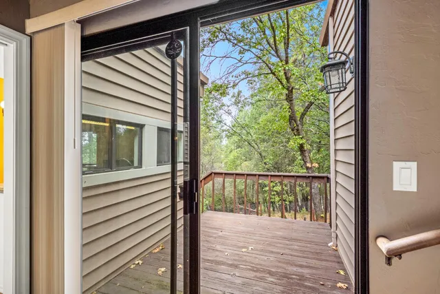 a view of a street with a building in the background