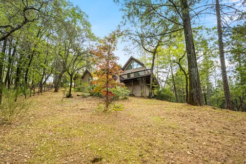 a view of a garden with a fountain