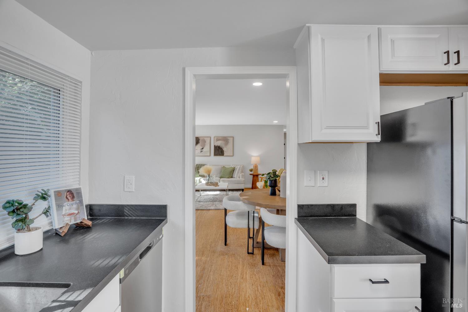 2785 Canyon Creek Drive San Ramon, CA 94583 - Photo 12 of 36 a kitchen with stainless steel appliances granite countertop a sink refrigerator and cabinets