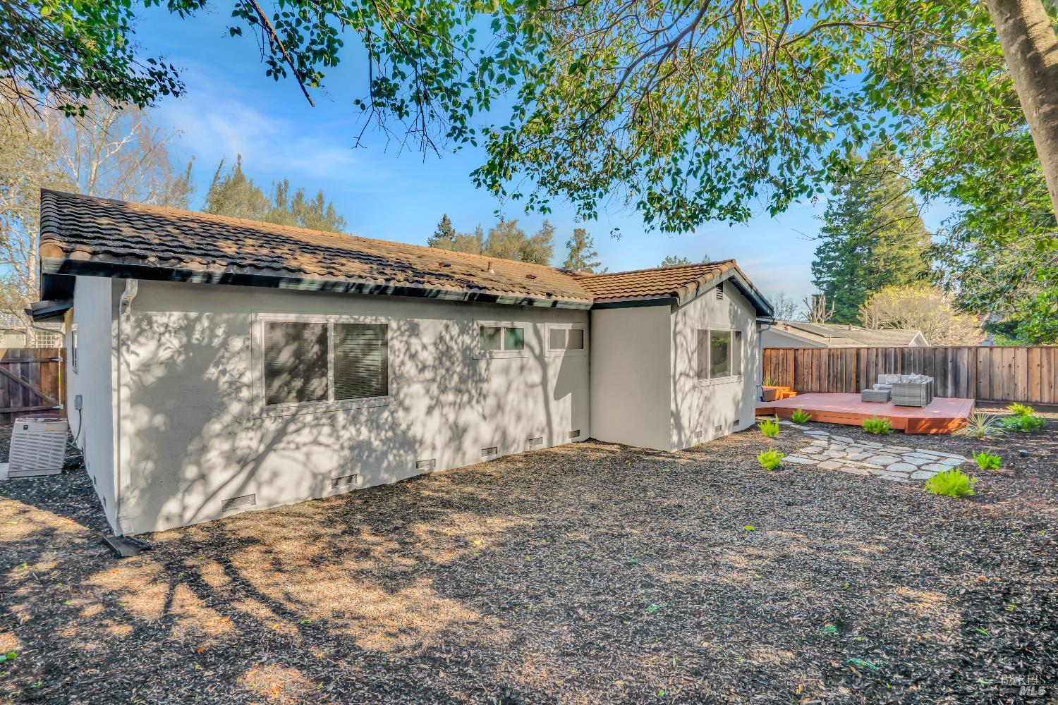 2785 Canyon Creek Drive San Ramon, CA 94583 - Photo 31 of 36 a backyard of a house with childrens swings and slides