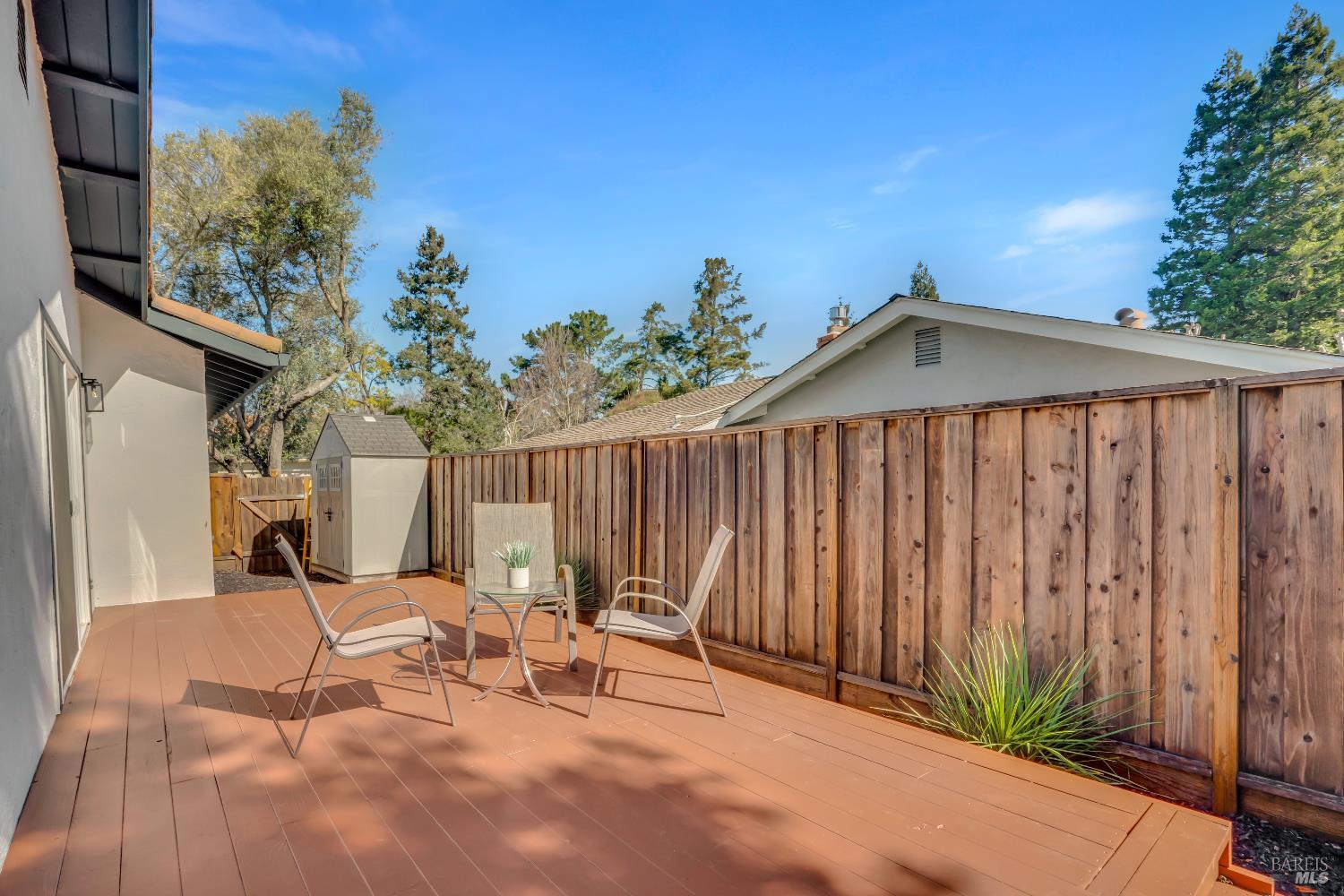 2785 Canyon Creek Drive San Ramon, CA 94583 - Photo 34 of 36 a view of a patio with a table and chairs and potted plants