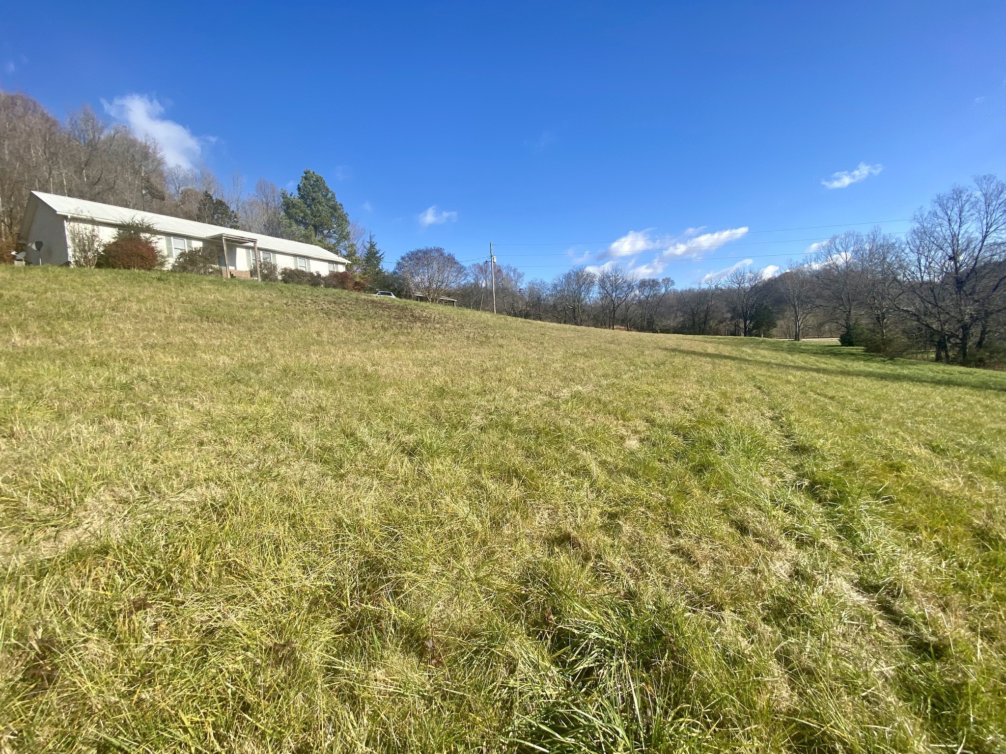 4570 Highway 64 Pulaski, TN 38478 - Photo 25 of 31 a view of a swimming pool with an outdoor space and seating area