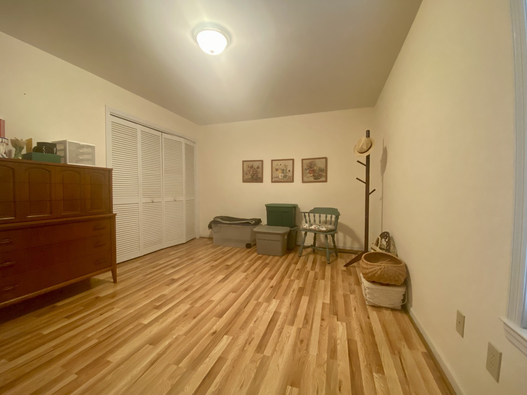 4570 Highway 64 Pulaski, TN 38478 - Photo 27 of 31 a bedroom with a bed and wooden floor