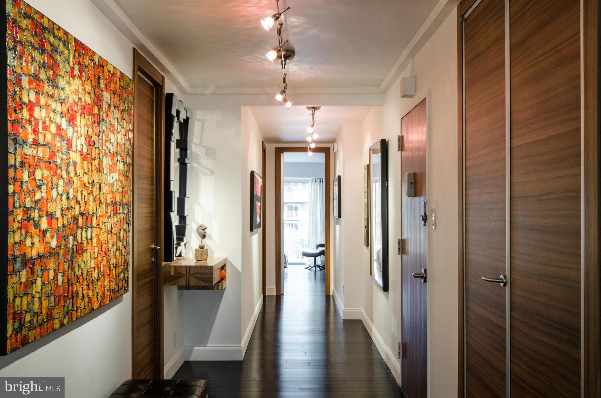 550 N Street Southwest, Unit S201 Washington, DC 20024 - Photo 16 of 30 a view of a hallway with wooden floor and windows