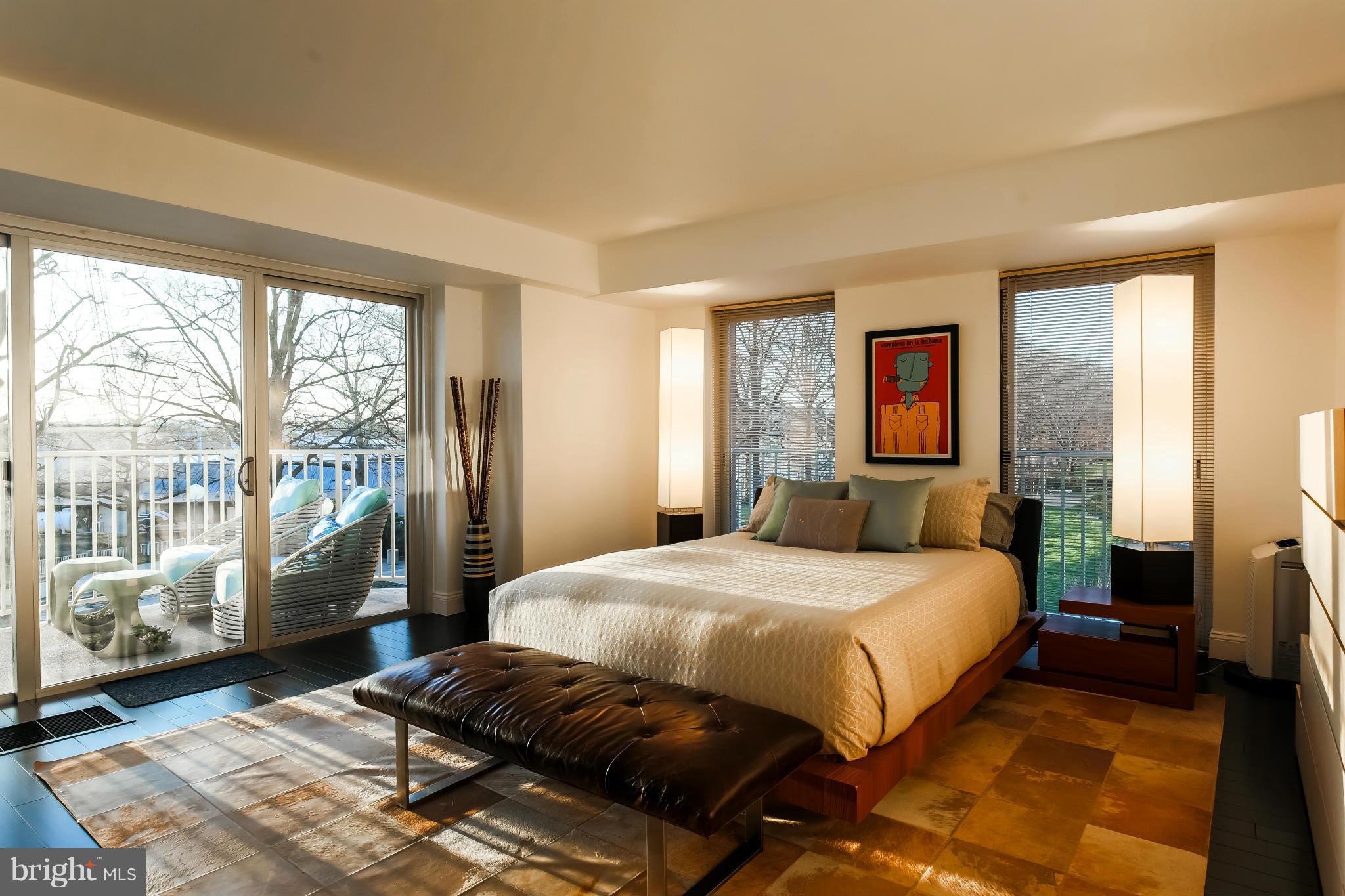 550 N Street Southwest, Unit S201 Washington, DC 20024 - Photo 17 of 30 a bedroom with a large bed and a window