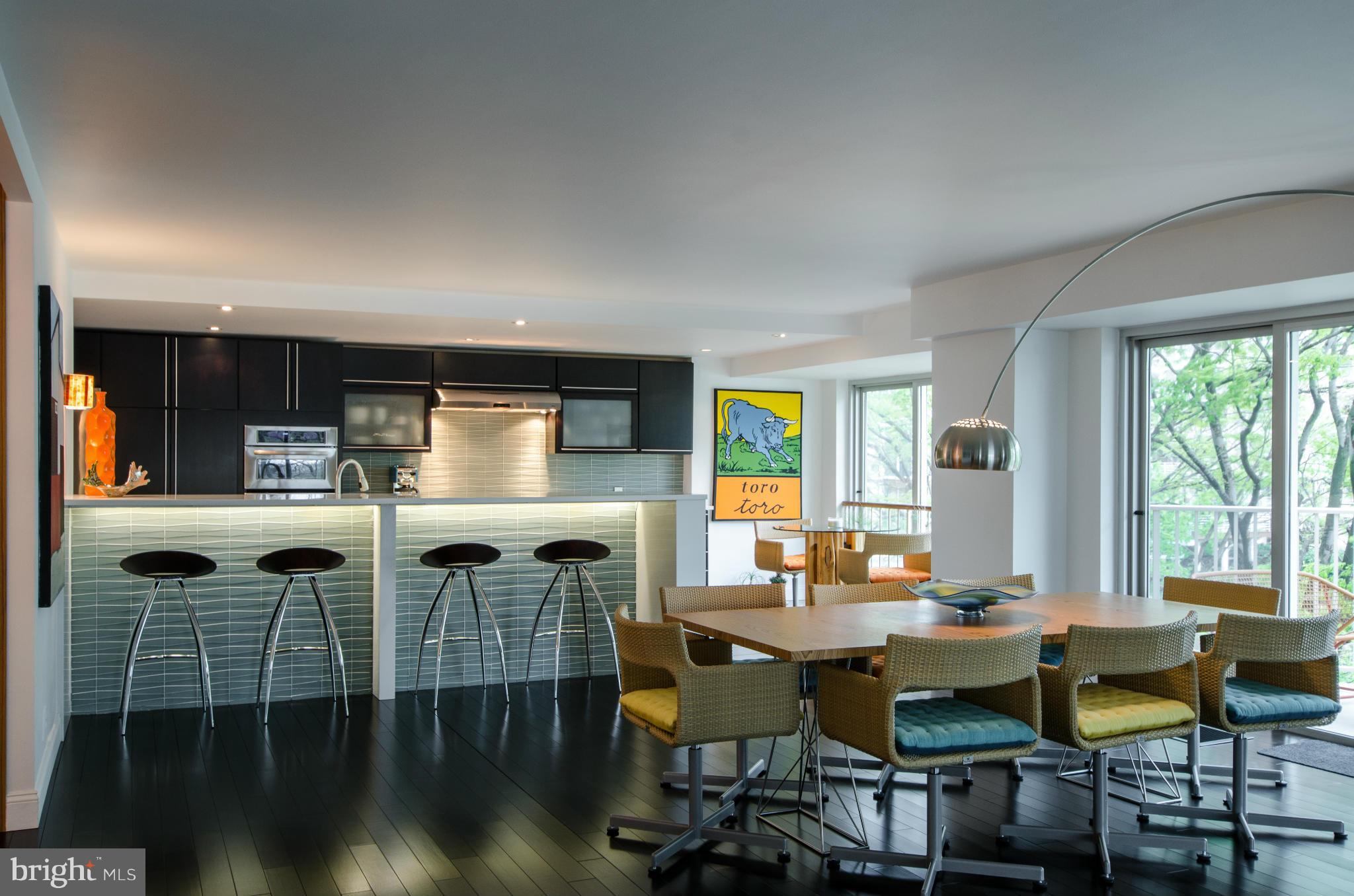 550 N Street Southwest, Unit S201 Washington, DC 20024 - Photo 7 of 30 a view of a dining room with furniture and wooden floor