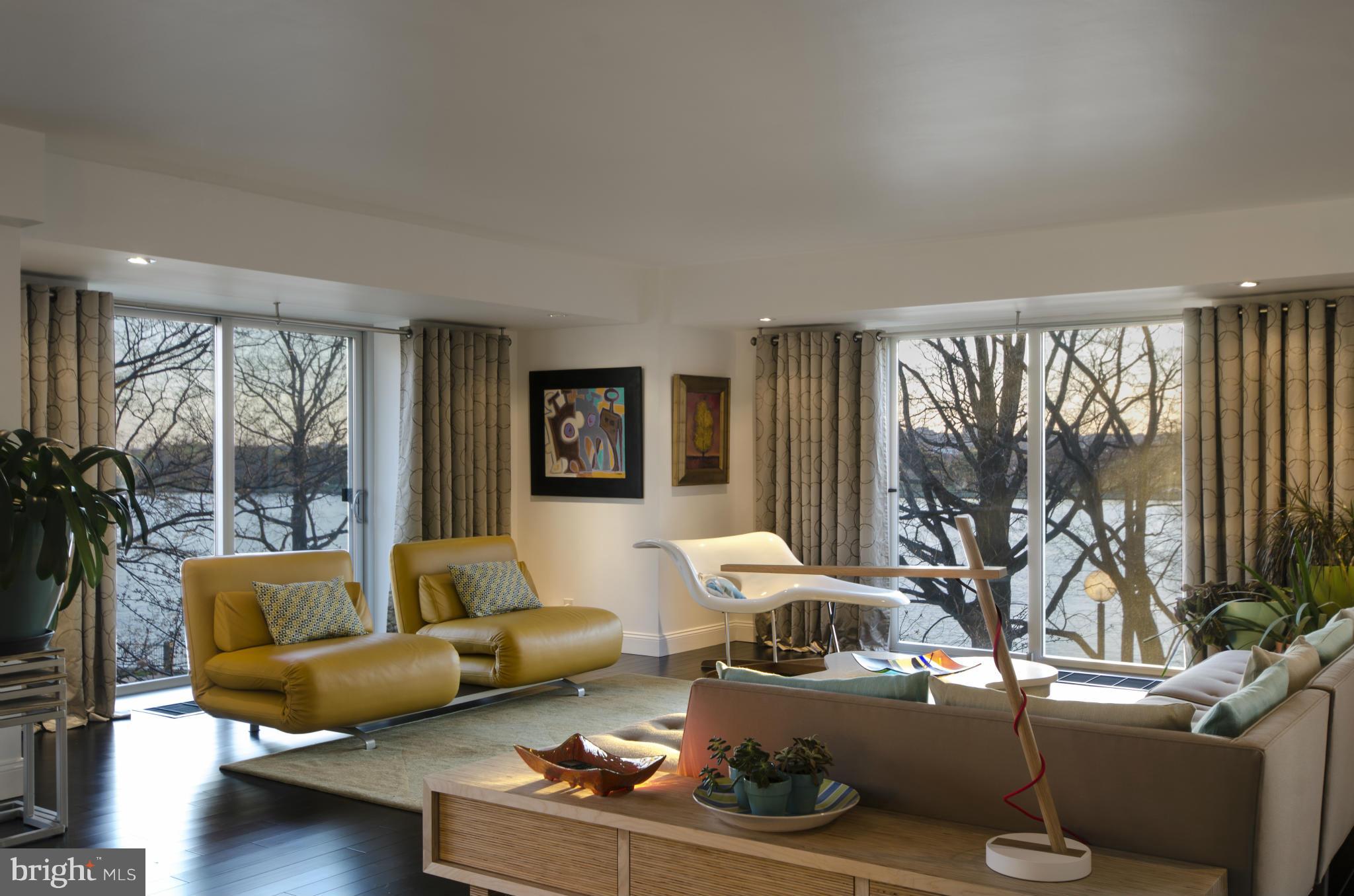550 N Street Southwest, Unit S201 Washington, DC 20024 - Photo 10 of 30 a living room with furniture and a large window