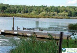 0 West Ridge Drive Newfoundland, PA 18445 - Photo 2 of 8 a view of a lake with a mountain in the background