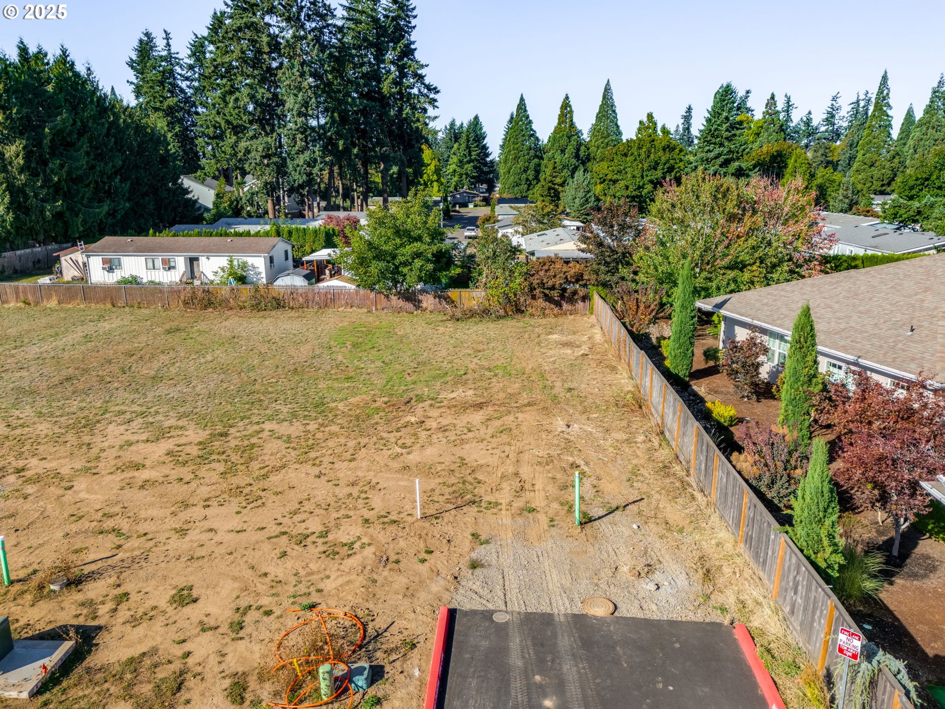 442 Southwest 15th Avenue, Unit 15 Canby, OR 97013 - Photo 1 of 2 a view of a pathway with a yard