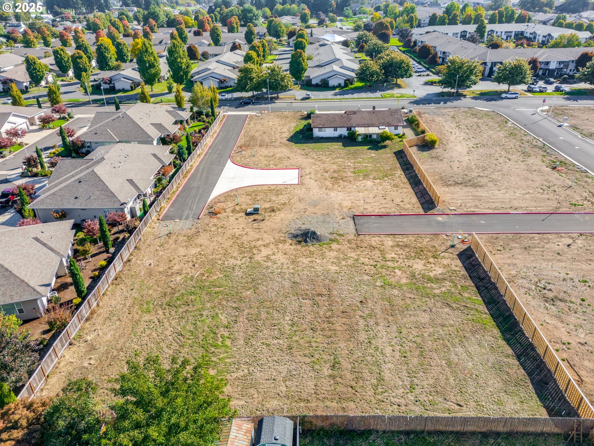 442 Southwest 15th Avenue, Unit 15 Canby, OR 97013 - Photo 2 of 2 an aerial view of a house with a yard