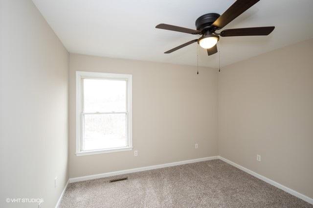 321 Pernello Road Ferrum, VA 24088 - Photo 12 of 25 an empty room with a window and a fan