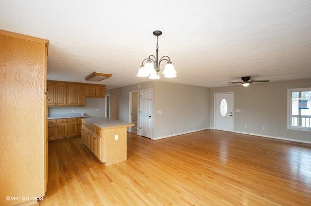 321 Pernello Road Ferrum, VA 24088 - Photo 7 of 25 a view of a kitchen with wooden floor and a sink