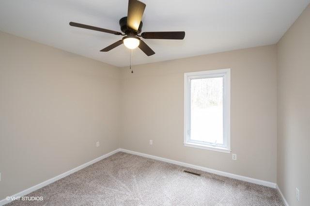 321 Pernello Road Ferrum, VA 24088 - Photo 10 of 25 an empty room with a window and a fan