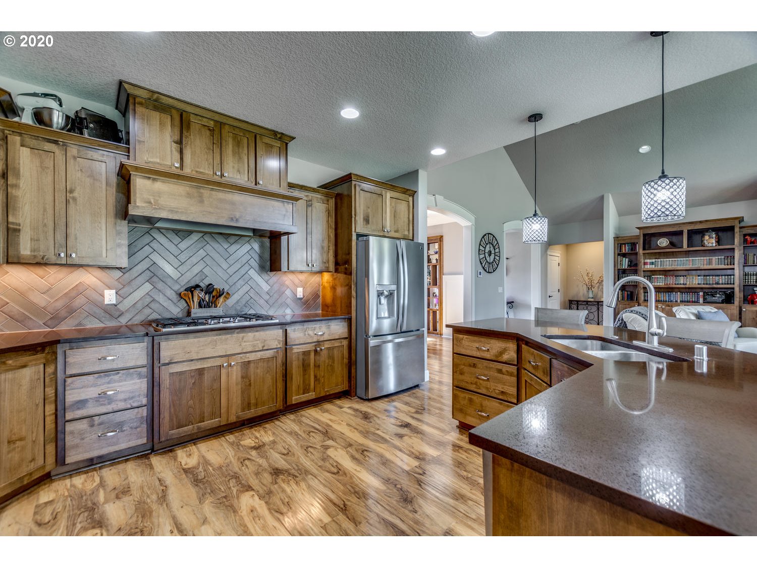 1704 Northwest 179th Street Ridgefield, WA 98642 - Photo 16 of 28 a kitchen with stainless steel appliances granite countertop a sink a stove and refrigerator