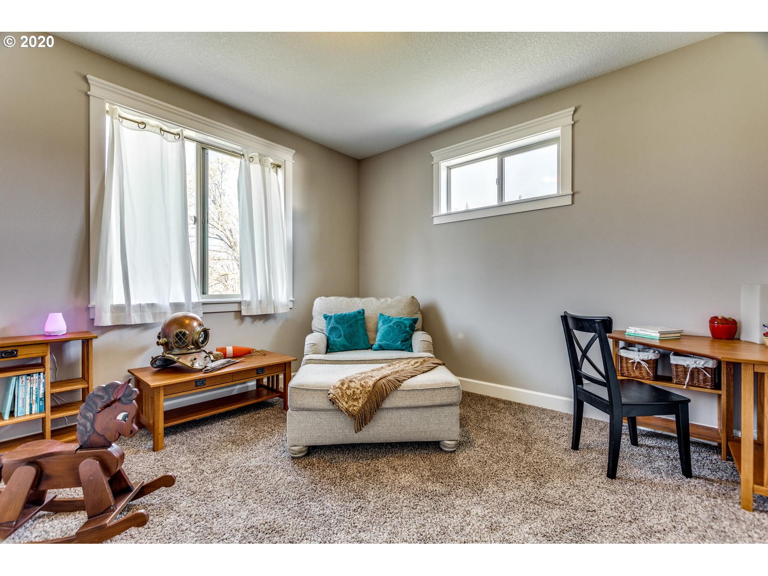 1704 Northwest 179th Street Ridgefield, WA 98642 - Photo 17 of 28 a bedroom with a bed and a window