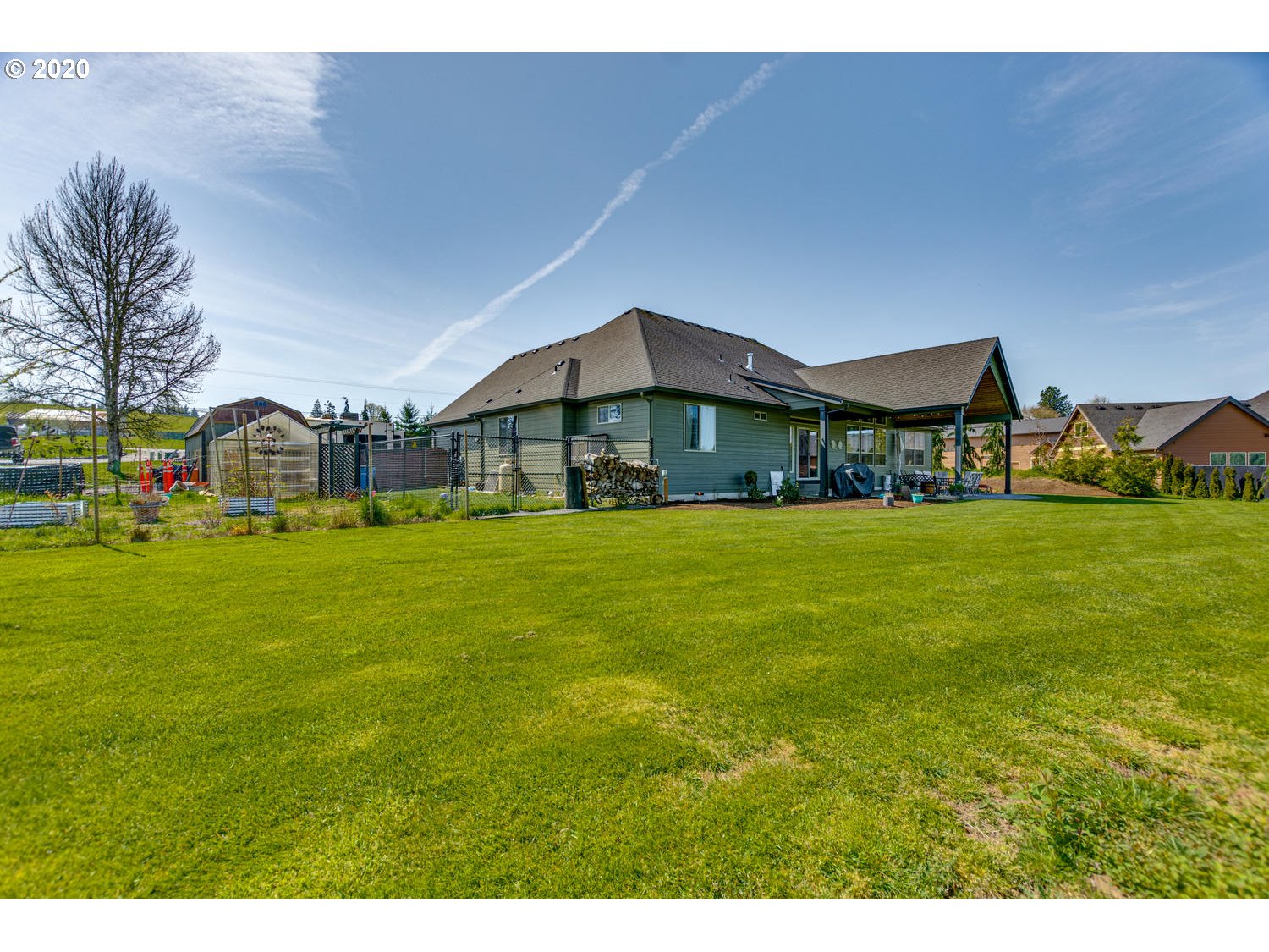 1704 Northwest 179th Street Ridgefield, WA 98642 - Photo 25 of 28 a house view with swimming pool in front of it