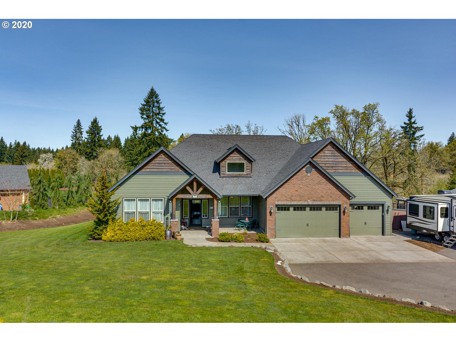 1704 Northwest 179th Street Ridgefield, WA 98642 - Photo 28 of 28 a front view of a house with a yard