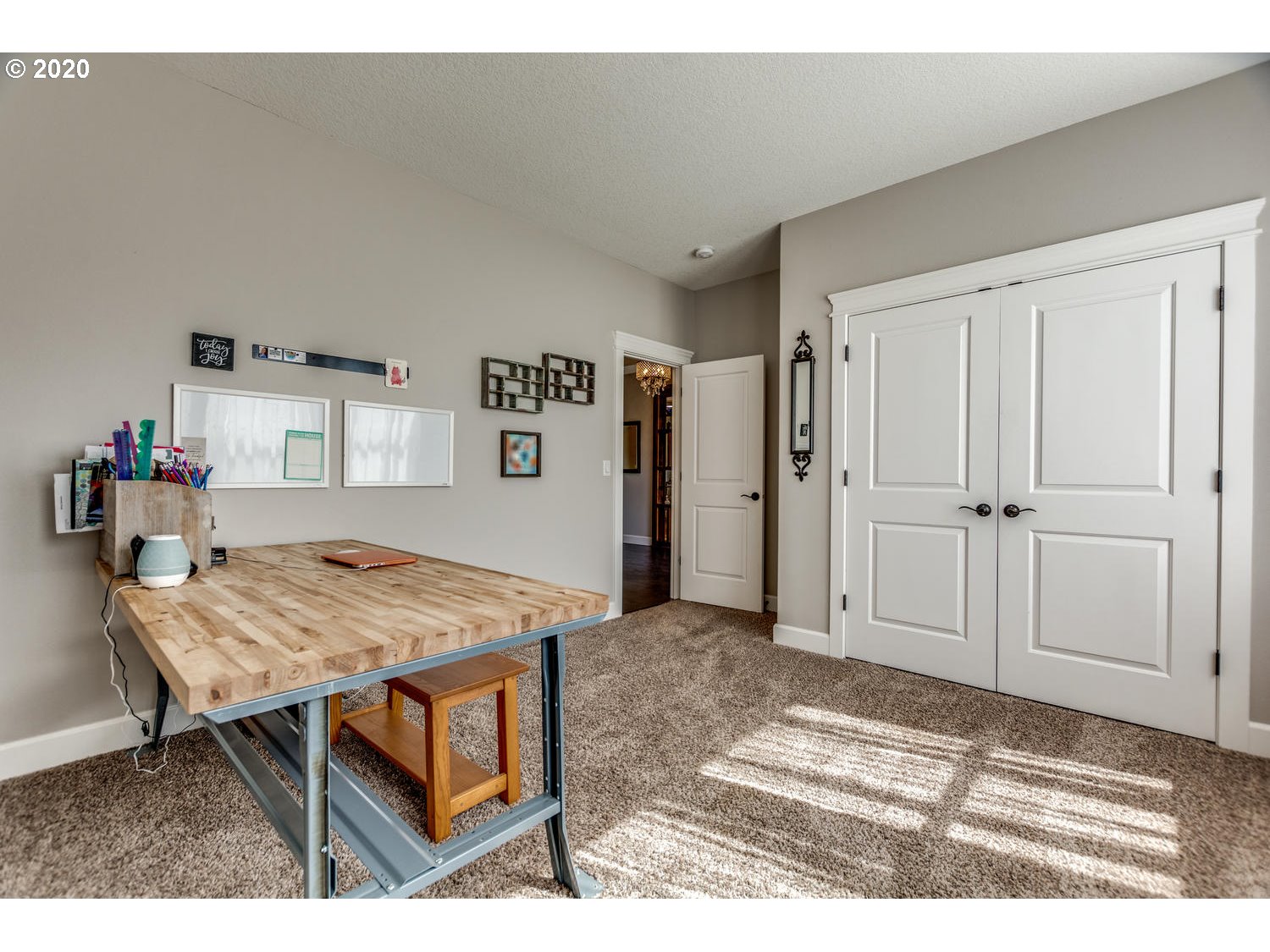 1704 Northwest 179th Street Ridgefield, WA 98642 - Photo 8 of 28 a view of kitchen island with furniture and wooden floor