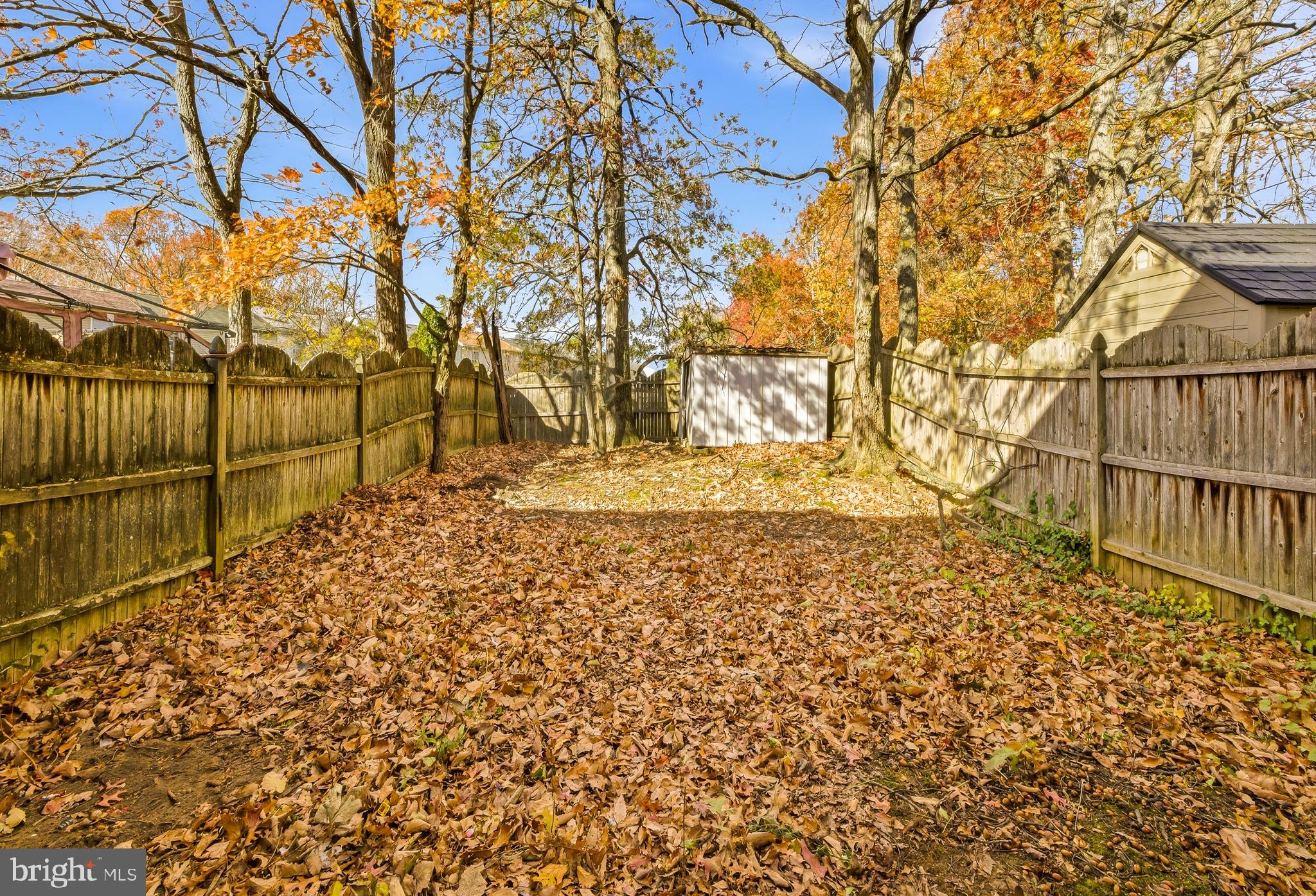 79 Edinshire Road Sicklerville, NJ 08081 - Photo 11 of 11 a view of yard with wooden fence