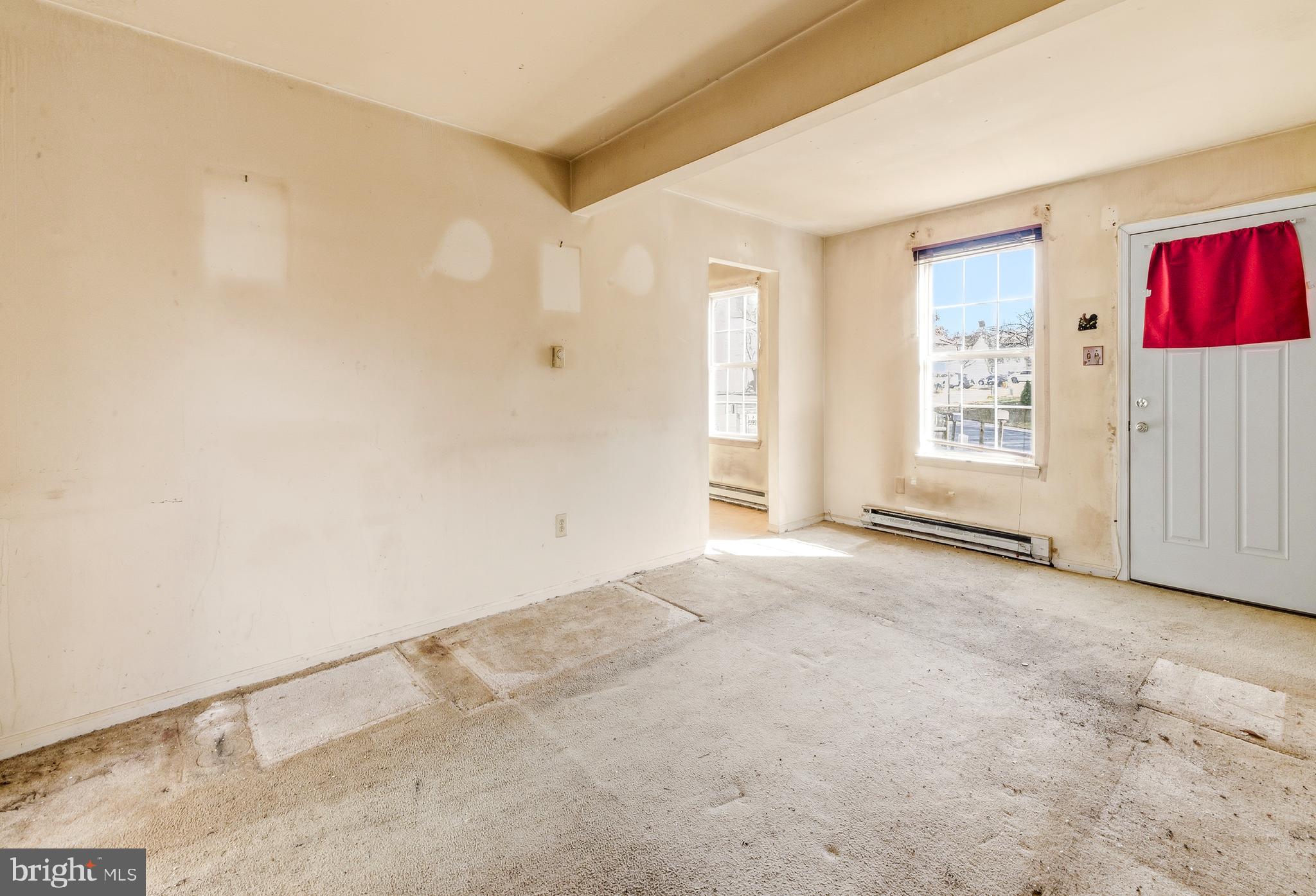 79 Edinshire Road Sicklerville, NJ 08081 - Photo 2 of 11 an empty room with windows