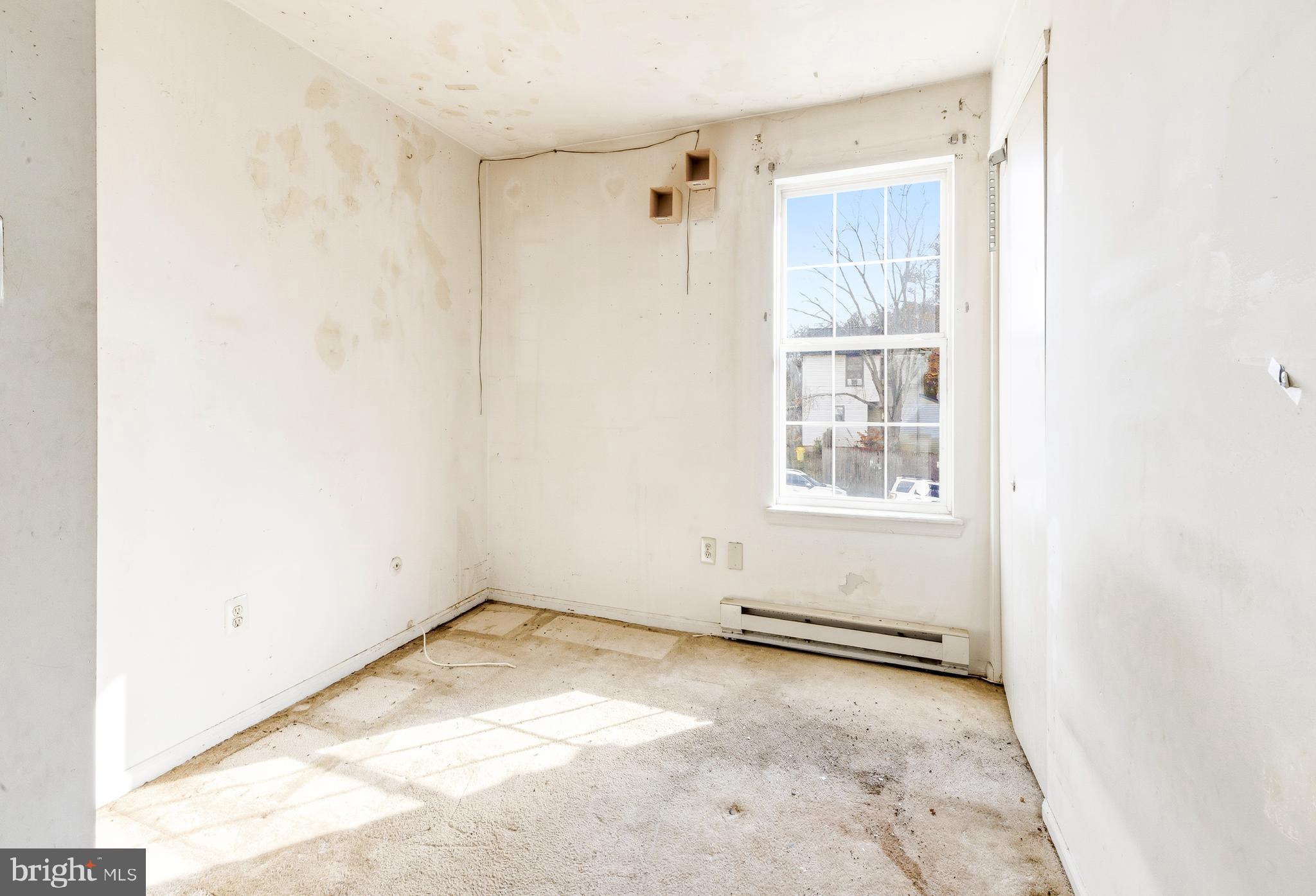 79 Edinshire Road Sicklerville, NJ 08081 - Photo 8 of 11 an empty room with windows