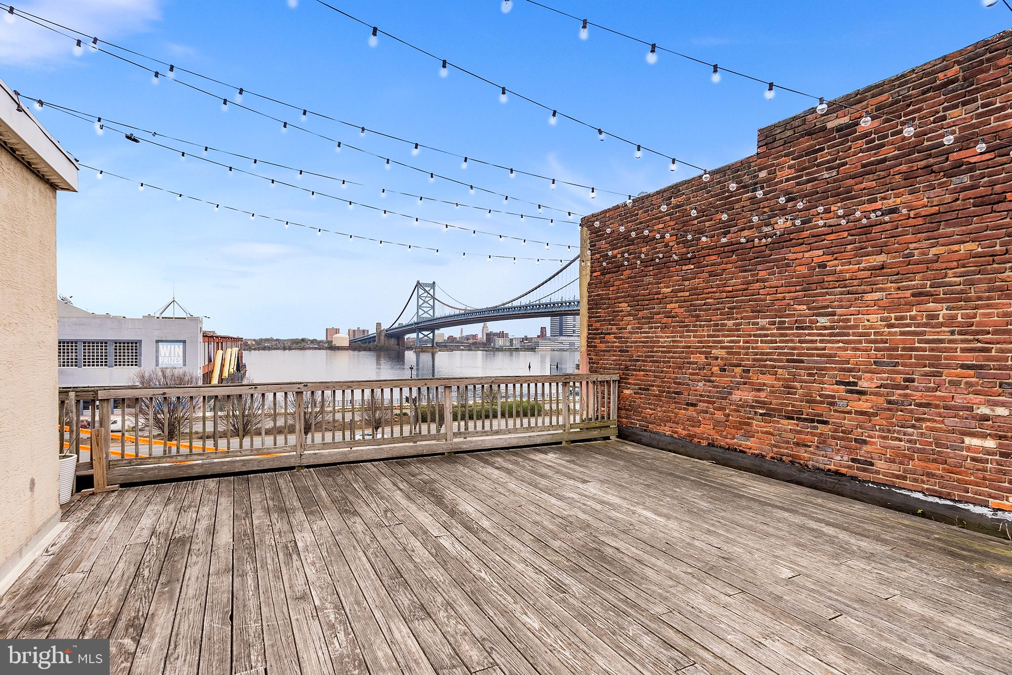 321-23 North Front Street, Unit 6 Philadelphia, PA 19106 - Photo 11 of 16 a view of a balcony with wooden floor