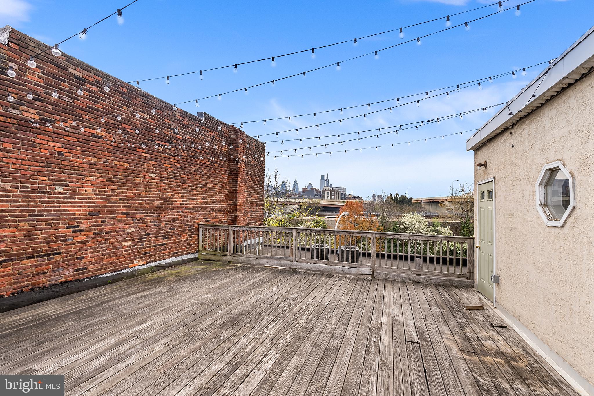321-23 North Front Street, Unit 6 Philadelphia, PA 19106 - Photo 13 of 16 a view of a balcony with wooden floor