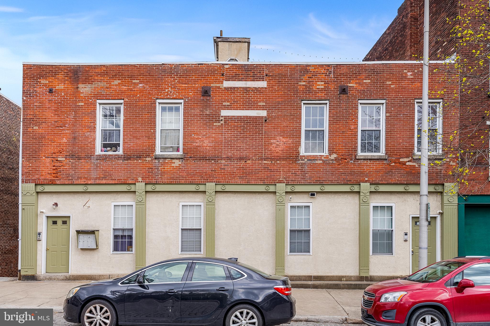 321-23 North Front Street, Unit 6 Philadelphia, PA 19106 - Photo 16 of 16 a front view of a building with parking space