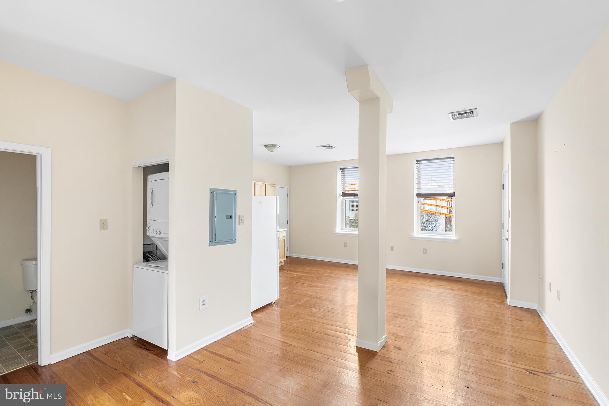 321-23 North Front Street, Unit 6 Philadelphia, PA 19106 - Photo 4 of 16 a view of a big room with wooden floor and windows