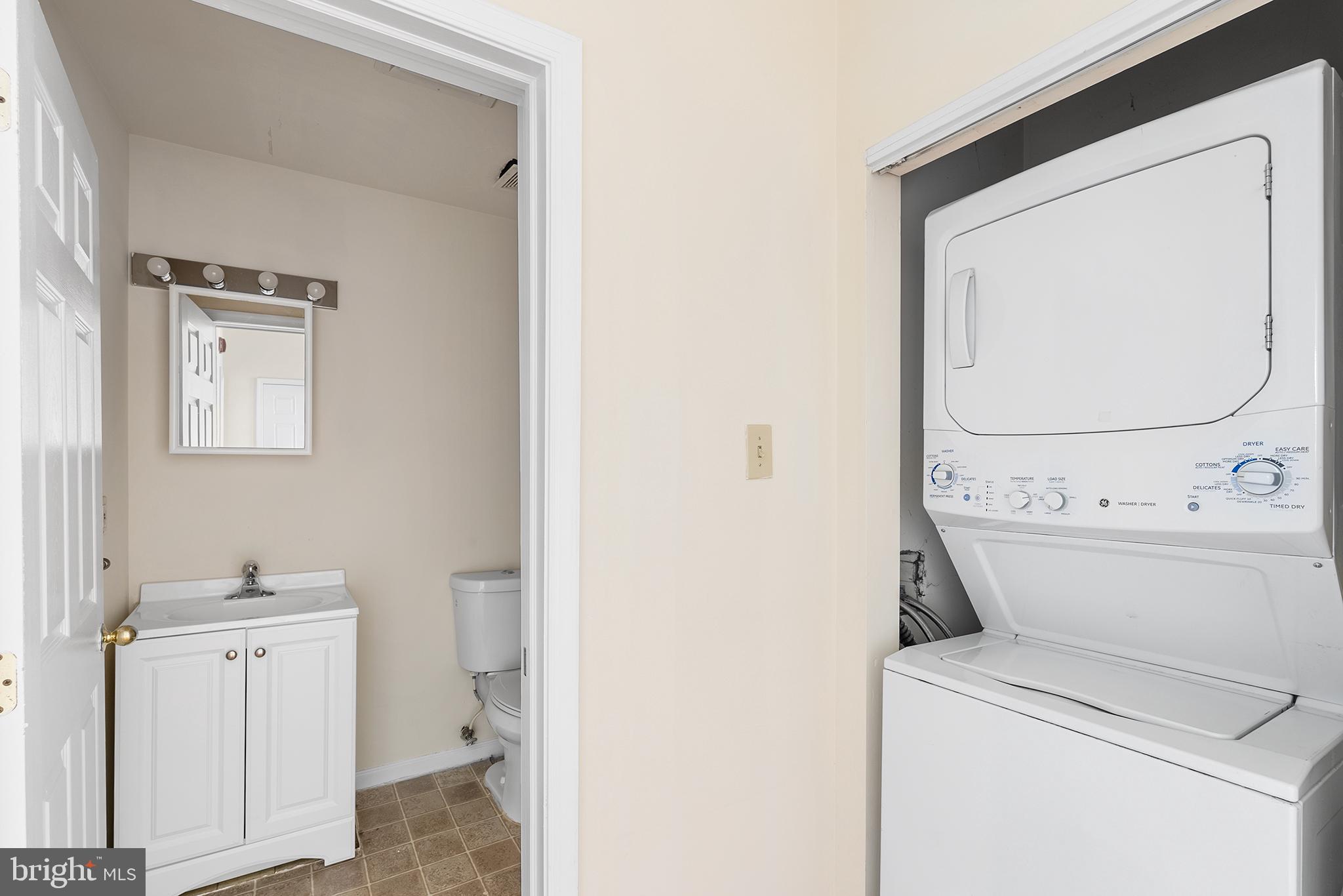 321-23 North Front Street, Unit 6 Philadelphia, PA 19106 - Photo 5 of 16 a view of bathroom with a washer and dryer