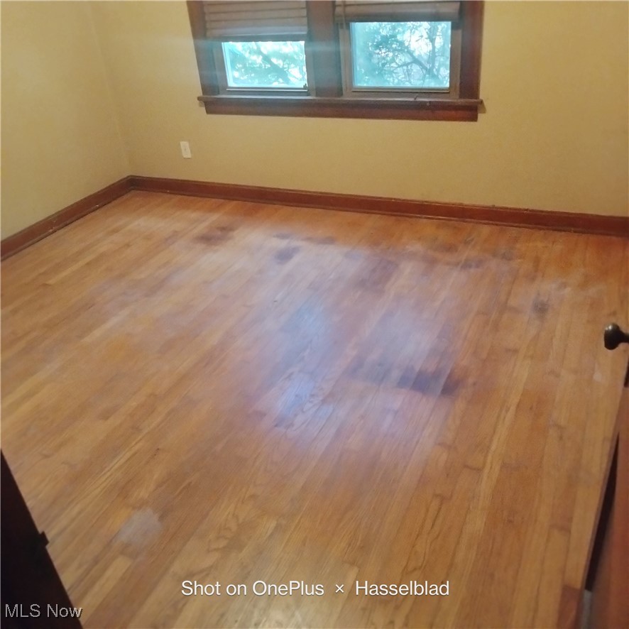1952 Hubbard Masury Road Hubbard, OH 44425 - Photo 13 of 20 Empty room featuring baseboards and light wood-style floors