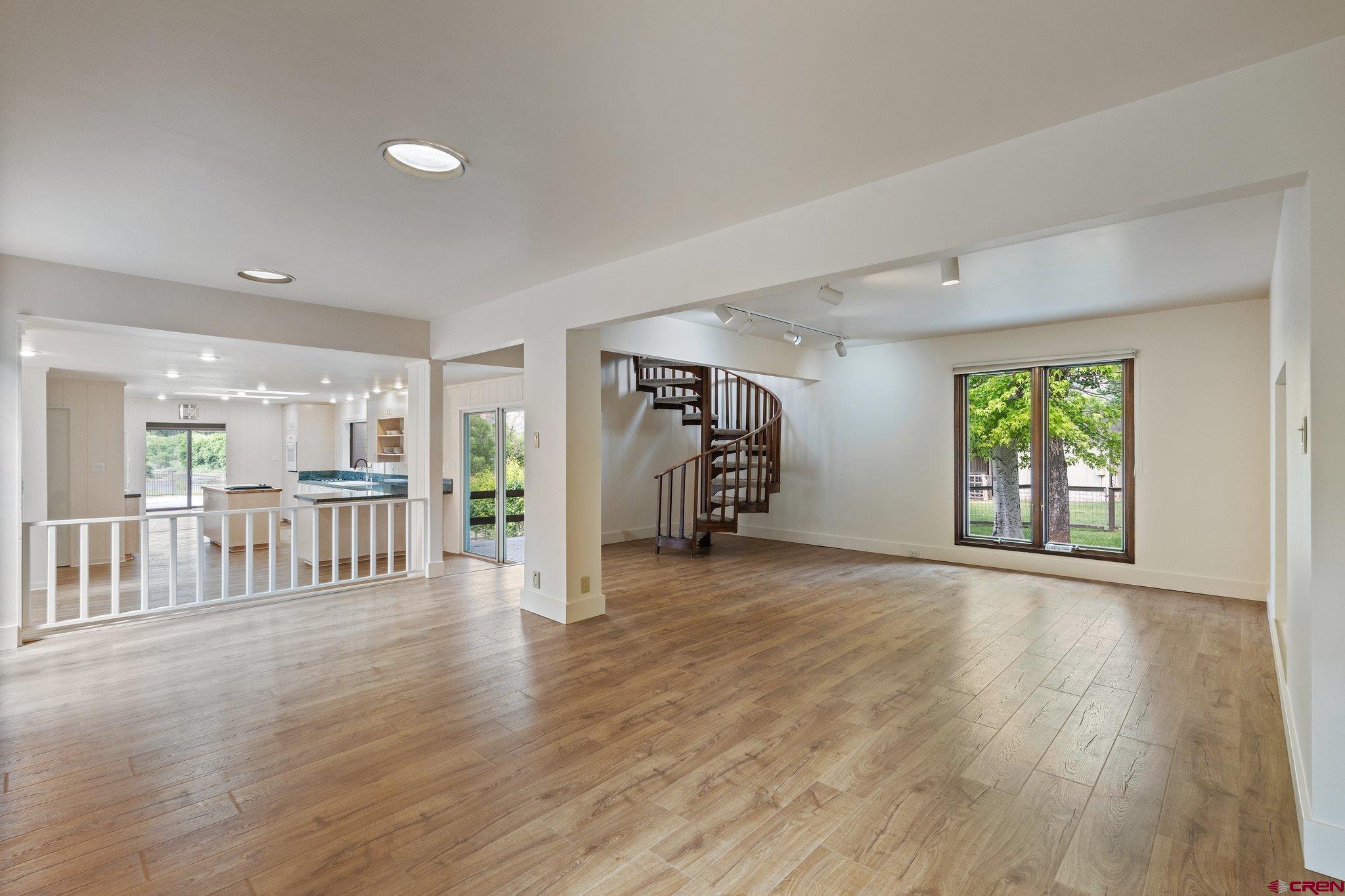 2565 County Road 250 Durango, CO 81301 - Photo 19 of 35 a view of a livingroom with wooden floor and windows