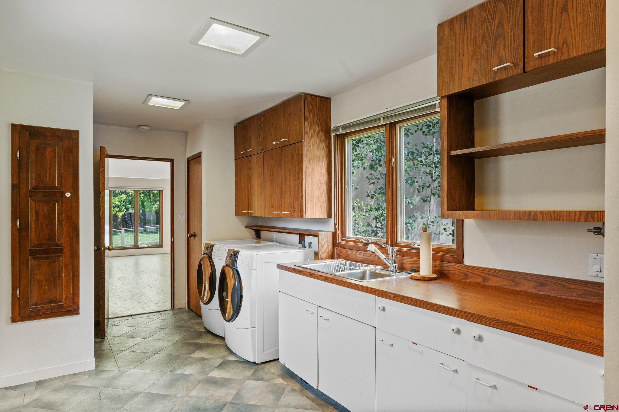 2565 County Road 250 Durango, CO 81301 - Photo 25 of 35 a kitchen with stainless steel appliances granite countertop a sink and a cabinets