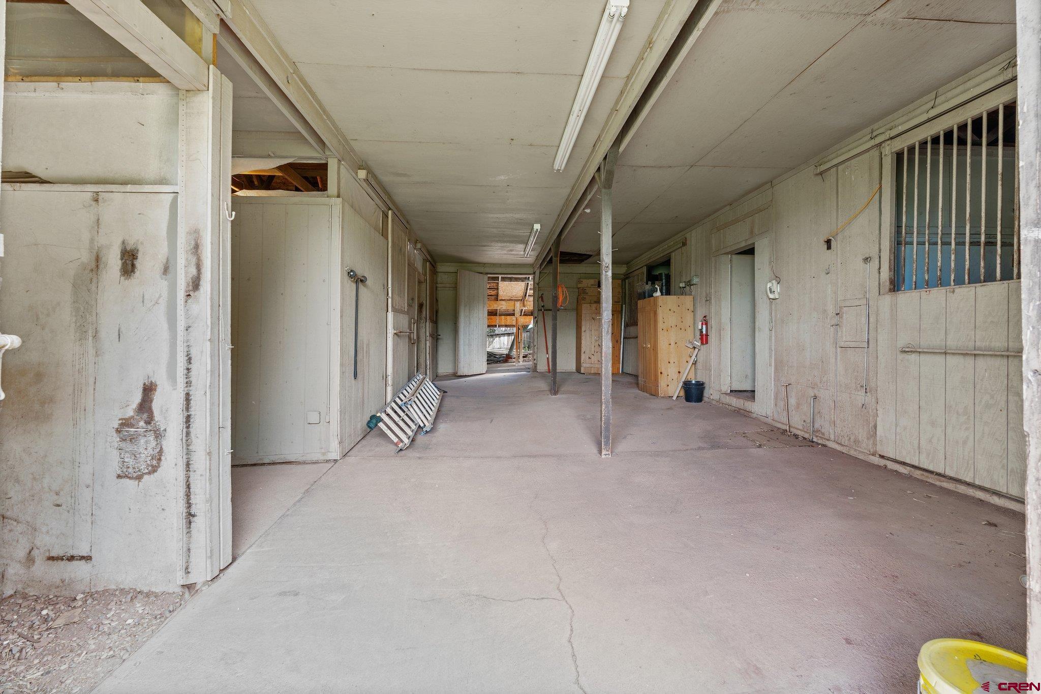 2565 County Road 250 Durango, CO 81301 - Photo 31 of 35 a view of a hallway with wooden shelves