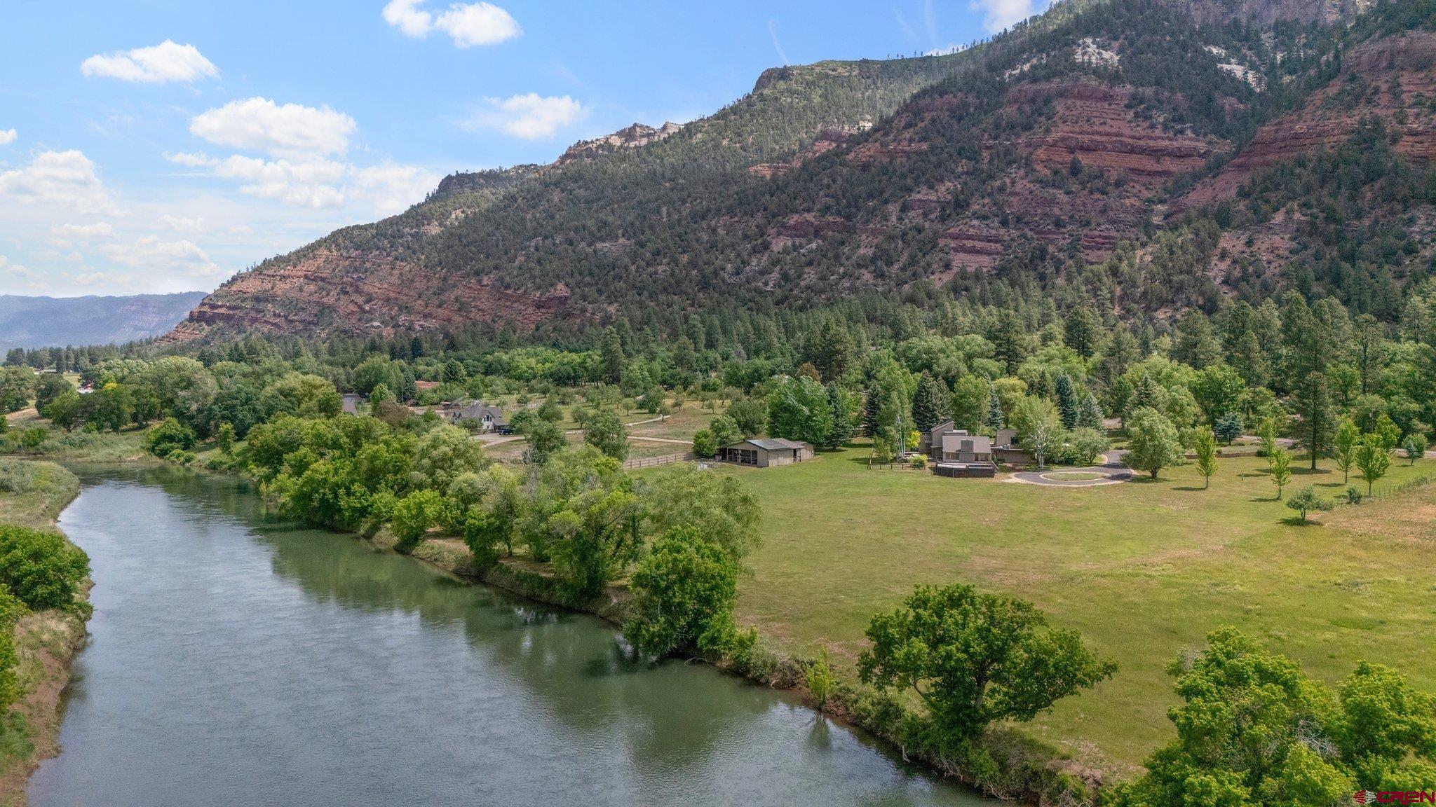 2565 County Road 250 Durango, CO 81301 - Photo 5 of 35 a view of a lake with a mountain in the background