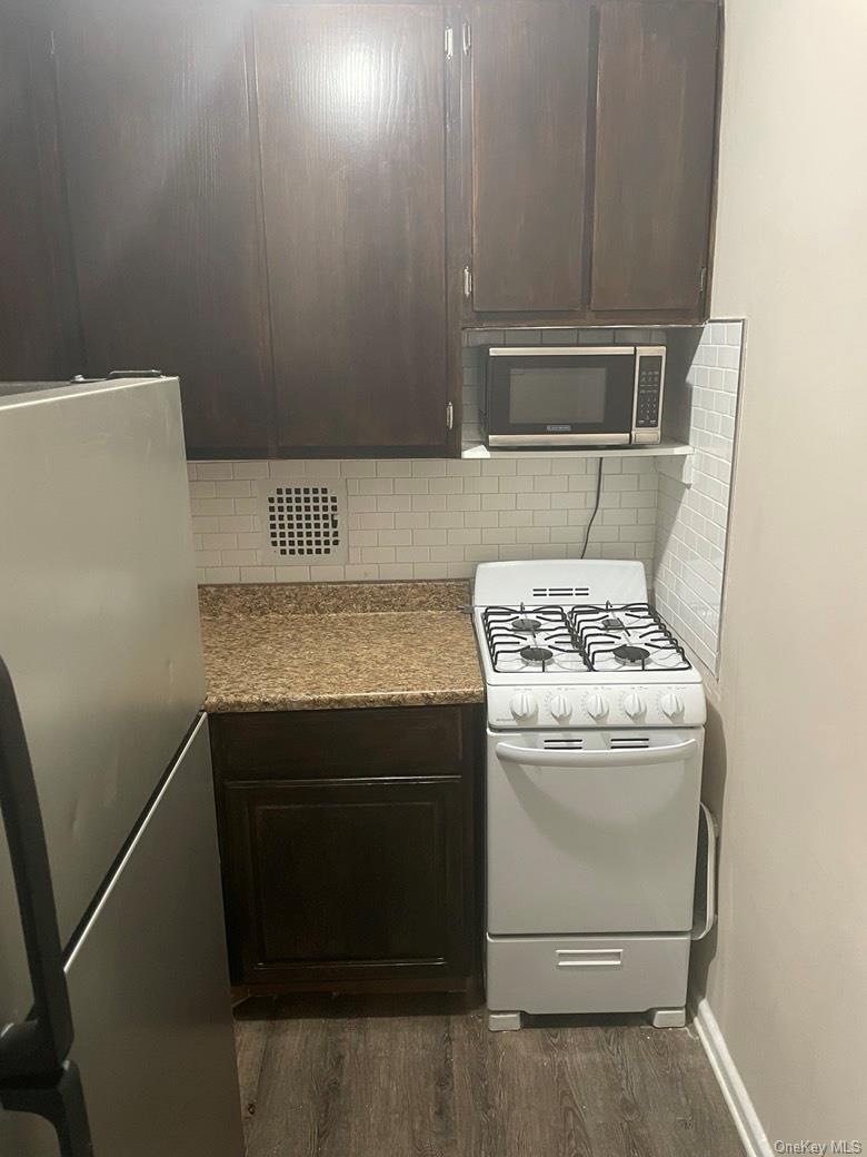 151-05 Cross Island Parkway, Unit 2F Queens, NY 11357 - Photo 9 of 16 a view of washer and dryer