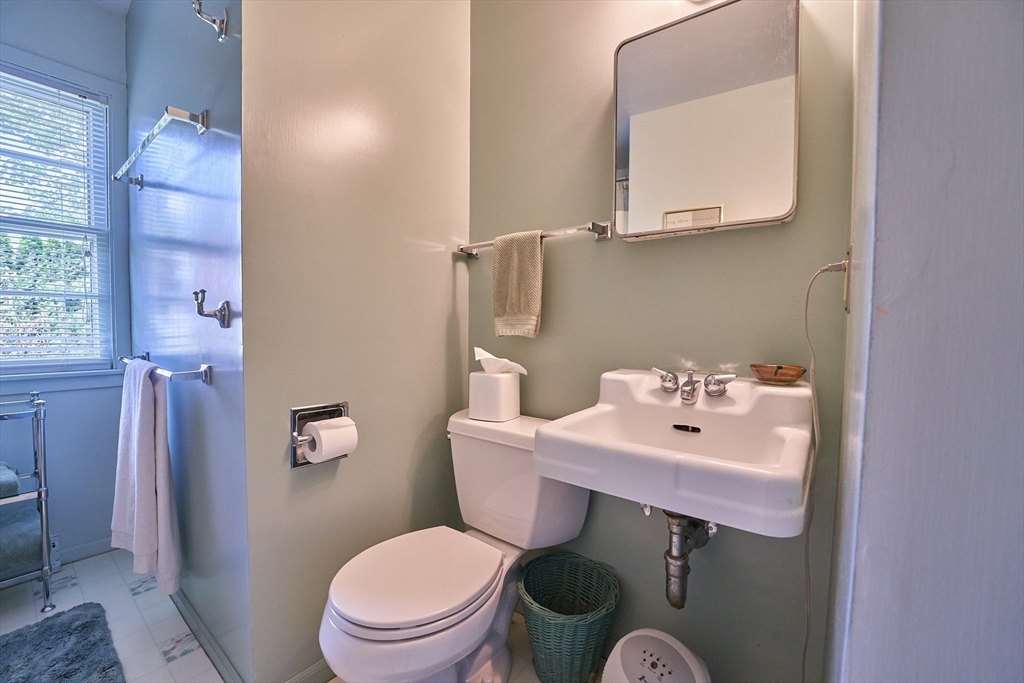 48 Sterling Road Northampton, MA 01062 - Photo 21 of 42 a bathroom with a toilet a sink and mirror