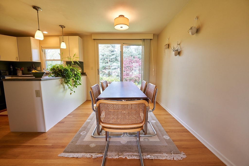 48 Sterling Road Northampton, MA 01062 - Photo 10 of 42 a view of a dining room with furniture window and wooden floor