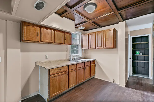 a hallway with washer and dryer