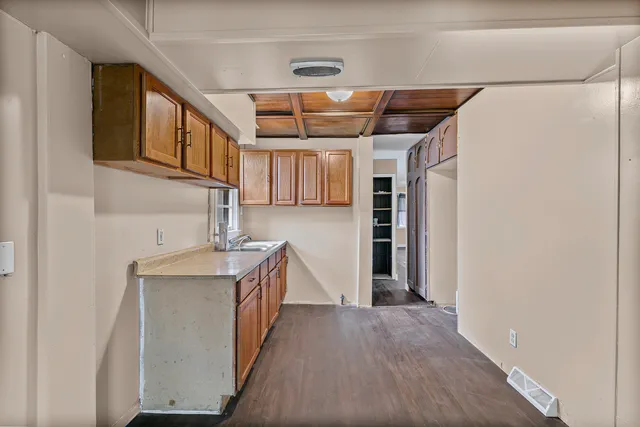 a view of an empty room with a window