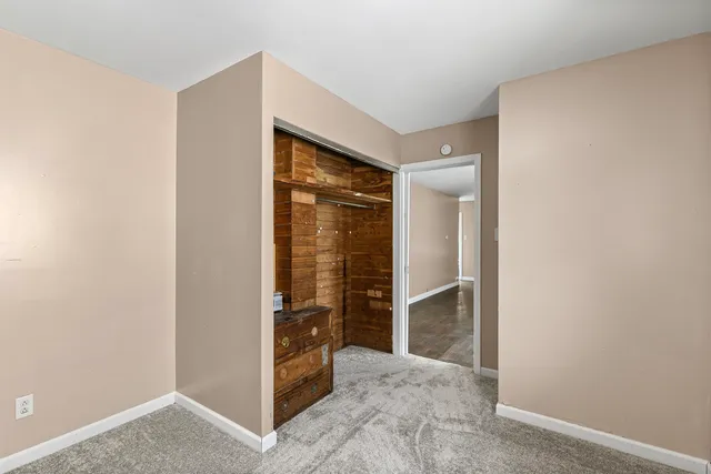 a bathroom with a toilet and bathtub