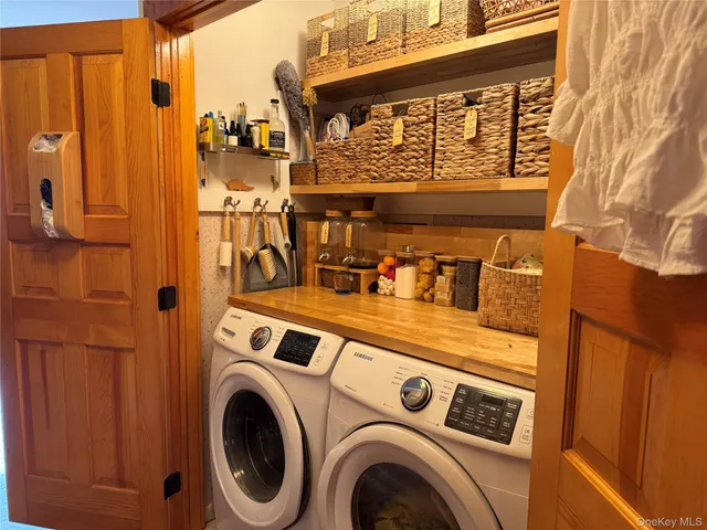 a utility room with dryer and washer