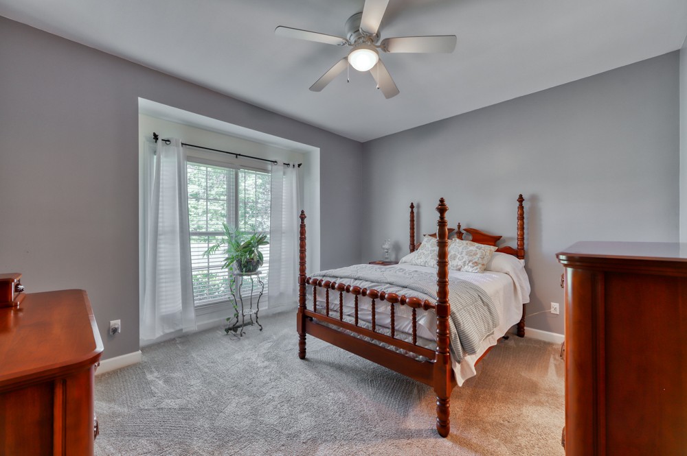 7880 Pinewood Road Fairview, TN 37062 - Photo 22 of 46 a bedroom with a bed and a window