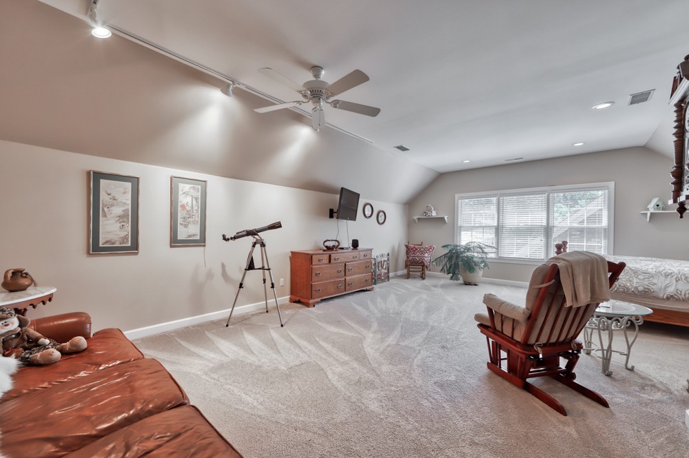 7880 Pinewood Road Fairview, TN 37062 - Photo 30 of 46 a bedroom with furniture and a large window