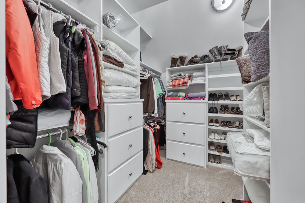 7880 Pinewood Road Fairview, TN 37062 - Photo 32 of 46 a view of walk in closet with clothes and shoes