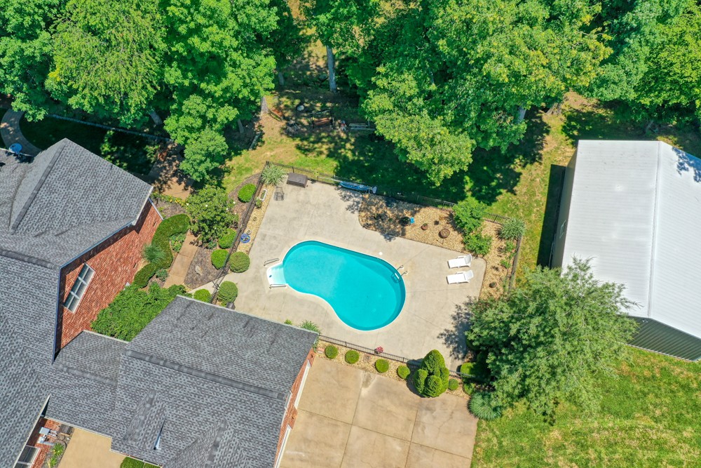 7880 Pinewood Road Fairview, TN 37062 - Photo 35 of 46 an aerial view of a house with a swimming pool