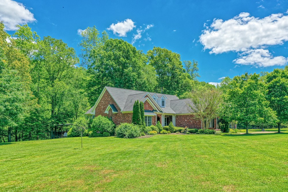 7880 Pinewood Road Fairview, TN 37062 - Photo 4 of 46 a aerial view of a house with garden
