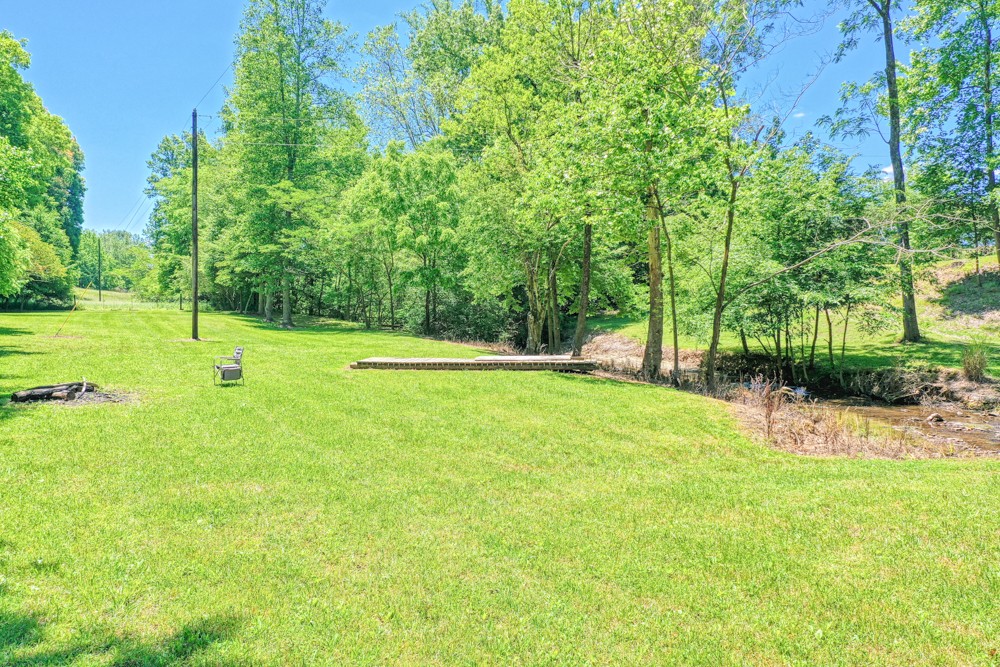 7880 Pinewood Road Fairview, TN 37062 - Photo 41 of 46 a view of field with tall trees