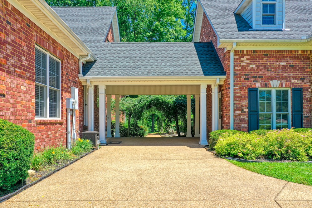 7880 Pinewood Road Fairview, TN 37062 - Photo 7 of 46 a front view of a house with garden